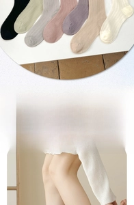 Breathable mid-calf ribbed socks in multiple colors with elastic vertical knit texture