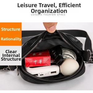 Detail view of black PU leather phone bag interior showing capacity for daily essentials