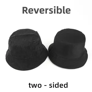 Reversible black corduroy bucket hat with dual fabric textures for unisex wear
