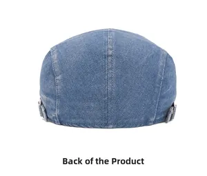 Back view of washed denim flat cap featuring adjustable silver metal side buckles