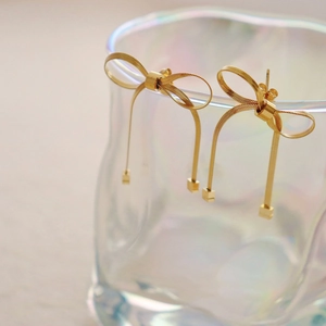 Minimalist gold knot bow earrings with snake chain and hanging square pendants for women
