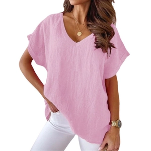 Detail of pink cotton linen V-neck T-shirt showing fabric texture and batwing short sleeves