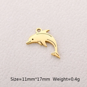 Detail of golden dolphin pendant with dimensions 11mm by 17mm and weight 0.4g