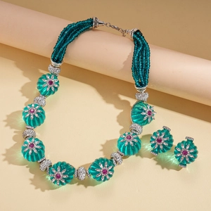 Retro jewelry set with green glass beads, floral diamond accents and silver necklace