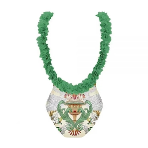 Detailed view of bridal neck accessory with green ruffled trim and vintage gold floral print