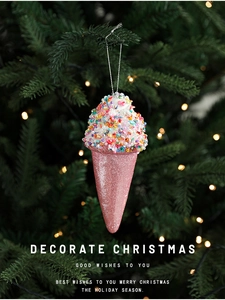 Pink ice cream cone Christmas ornament with glitter and colorful sprinkles on tree