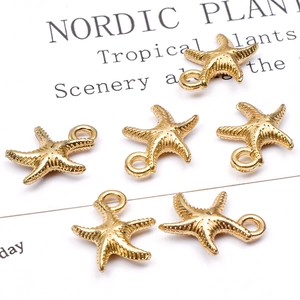 Set of six gold starfish alloy charms for DIY earring and jewelry making projects