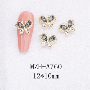 Detail of 12x10mm alloy butterfly nail art charms with grey rhinestones on gold base