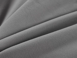 Close-up of the soft gray high-elasticity fabric texture with seamless knitted details