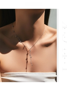 Detailed view of S925 silver star tassel Y-necklace featuring cubic zirconia accents