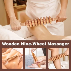 Macro detail of wooden nine-wheel massager rollers for leg and back muscle recovery