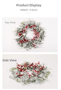 Detail of Christmas wreath with frosted eucalyptus leaves and red berries on white background