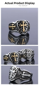 Macro detail of silver shield ring with gold cross inlay and vertical texture accents