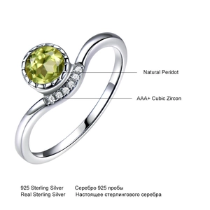925 sterling silver ring featuring natural green peridot and AAA cubic zirconia stones
