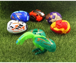 Close-up of colorful dinosaur transformation eggs on grass field with robot character