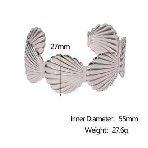 Detail of silver shell-shaped open bangle with dimensions 27mm height and 55mm inner diameter