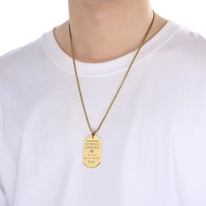 Gold stainless steel military tag necklace for men with DAD hero engraving on white t-shirt