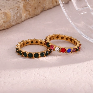 Detail showing 18K gold-plated stainless steel rings with green and colorful zircon micro-inlay