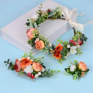 Detailed bridal hair set with orange and white rose floral crown and matching combs