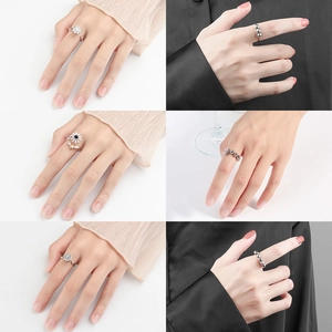 Adjustable silver fidget ring set with zircon snowflake and bee designs for women
