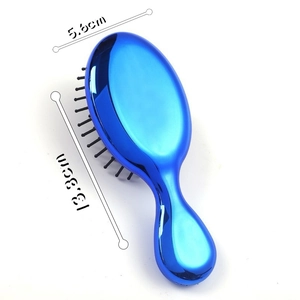 Mini portable hairbrush with blue glossy finish and product dimensions 13.3cm by 5.6cm