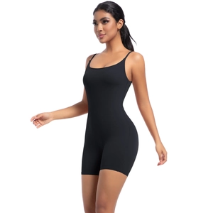 Close-up of black sleeveless yoga bodysuit with spaghetti straps and bodycon fit