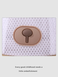 Detailed macro view of breathable white honeycomb mesh fabric with a brown mushroom patch