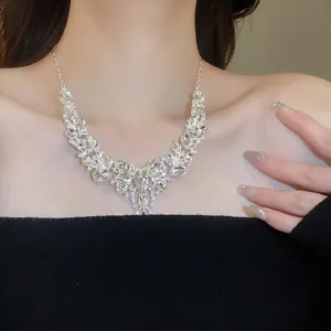 Elegant silver-toned V-shaped rhinestone necklace and earring set for weddings and parties