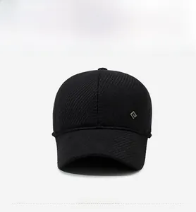 Front view of black winter baseball cap showing thick twill fabric and square metal logo