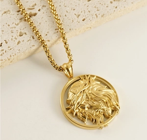 Detailed close-up of golden 3D relief Jesus pendant with crown of thorns on a linked chain