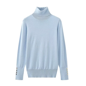 Slim fit light blue turtleneck sweater for women with gold button sleeve details