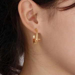 Golden titanium steel C-shaped earrings with hollow LOVE letters and Cuban chain texture