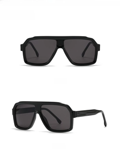 Detailed front and 45-degree side view of oversized black square sunglasses with dark lenses