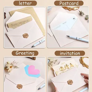 Pink linen texture envelope set with gold wax seal stamps and elegant stationery