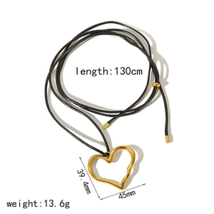 Gold heart pendant on black wax cord necklace with 130cm length and metal texture