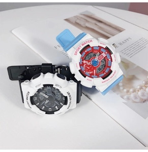 Close-up of black-white and red-blue-white waterproof sports watches with resin bands