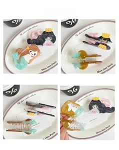 Close-up of mermaid hair claws showing crown detail and durable acrylic texture