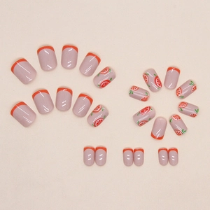 Short orange press-on nails with cute hand-painted fruit designs and french tips