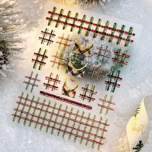 Embossed Christmas plaid nail stickers with bow designs in red, green and gold colors