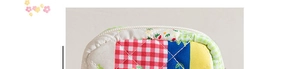 Detail of quilted floral sanitary bag with patchwork fabric and secure nylon zipper