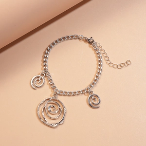 Detail of silver chain bracelet featuring spiral rose charms and adjustable lobster clasp