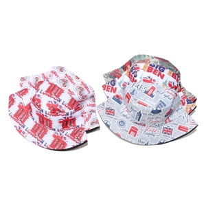 Detail of bucket hats featuring London Union Jack, Big Ben, and newspaper prints