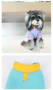 Detail view of colorful fleece dog vest featuring secure D-ring for leash attachment