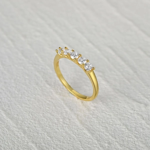 Elegant gold S925 sterling silver ring with a single row of five shimmering zircons