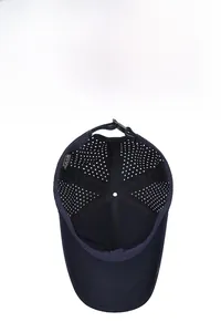 Detailed view of 100% cotton baseball cap showing interior ventilation holes and label