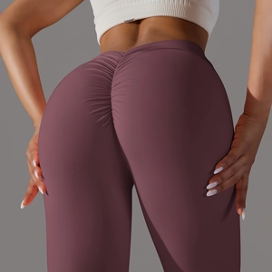 Close-up of high-waist yoga leggings with scrunch butt detail in mulberry purple matte fabric