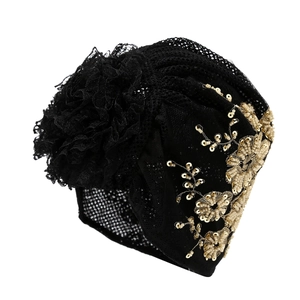 Women's black turban hat with floral lace and golden sequins in bohemian style