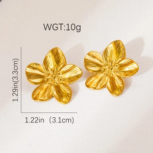Macro-opname van gouden bloemoorbellen met geborstelde textuur en afmetingen