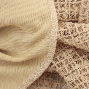 Sleeveless knit dress featuring premium beige lace texture and detailed seam stitching