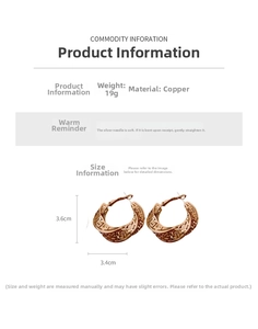 Macro detail of twisted gold hollow hoop earrings showing 3.6cm size and texture